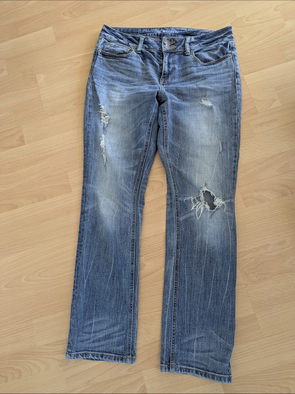 Women's Distressed Blue Boot Cut Jeans
